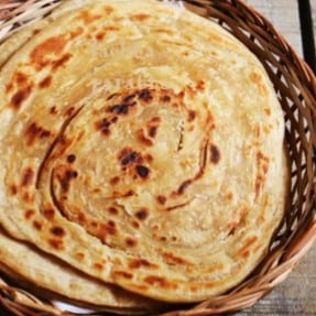 Lacha Paratha w/ egg & chai.